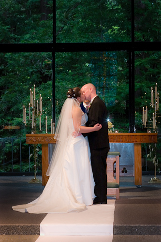 Valley Presbyterian, Woodside Wedding - bride and groom kissing on alter
